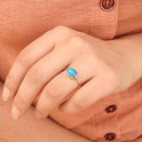 East-West Natural Oval Sleeping Beauty Bezel Turquoise Ring