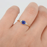 East-West Dainty Blue Sapphire Trio Diamond Engagement Ring