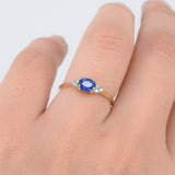 East-West Dainty Blue Sapphire Trio Diamond Engagement Ring