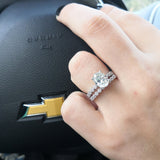 Oval Moissanite Solitaire Engagement Ring with a matching Natural Diamond Wedding Band
