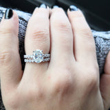 Oval Moissanite Solitaire Engagement Ring with a matching Natural Diamond Wedding Band