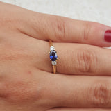 East-West Dainty Oval Blue Sapphire Engagement Ring