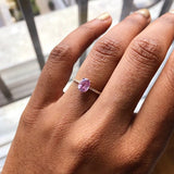 Oval Pink Sapphire Engagement Ring with a Matching Halo Diamond Wedding Band