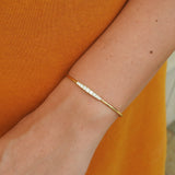 Graduate Diamond Gold Bangle - Thin Solid Gold Cuff
