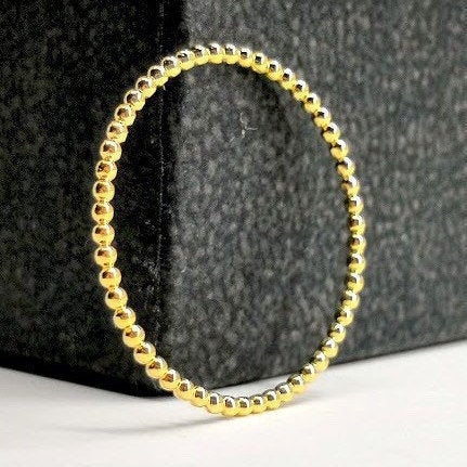 Thin Solid Gold Beaded Ring