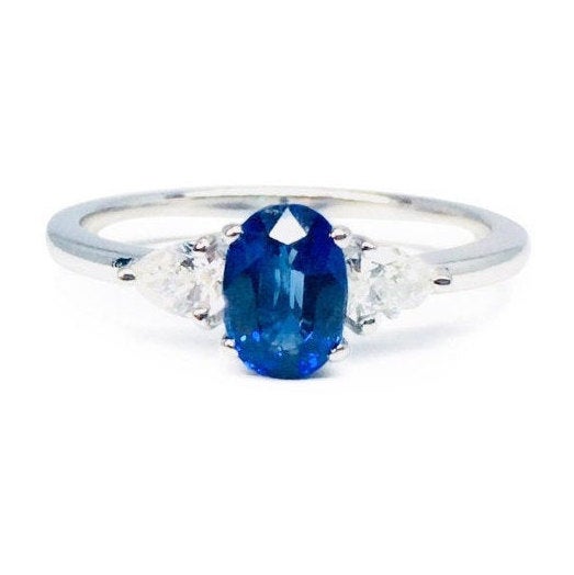 Oval Sapphire and Pear Diamonds Engagement Ring
