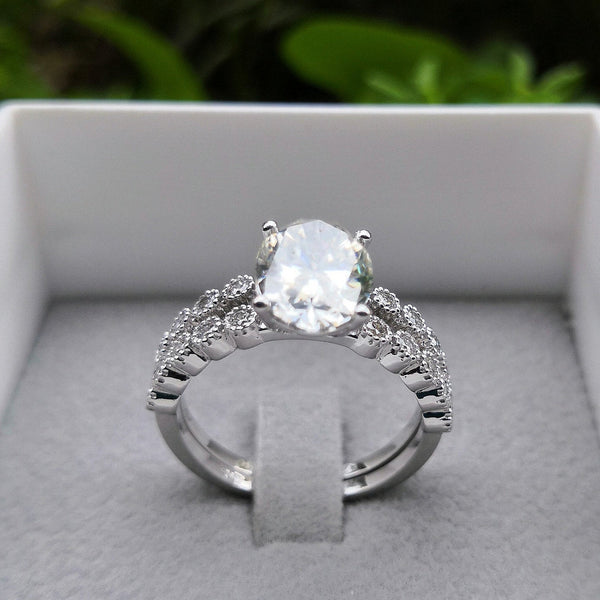 Oval Moissanite Solitaire Engagement Ring with a matching Natural Diamond Wedding Band