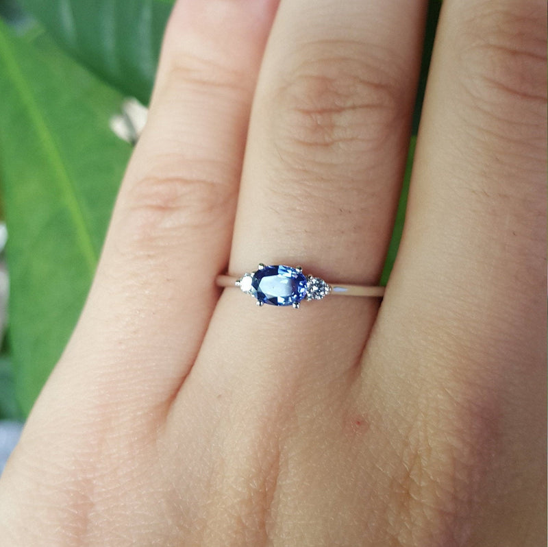 East-West Dainty Oval Blue Sapphire Engagement Ring